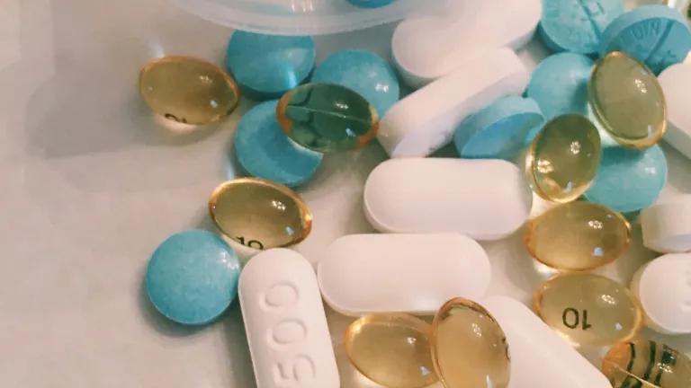 pills spilling out from a pill bottle