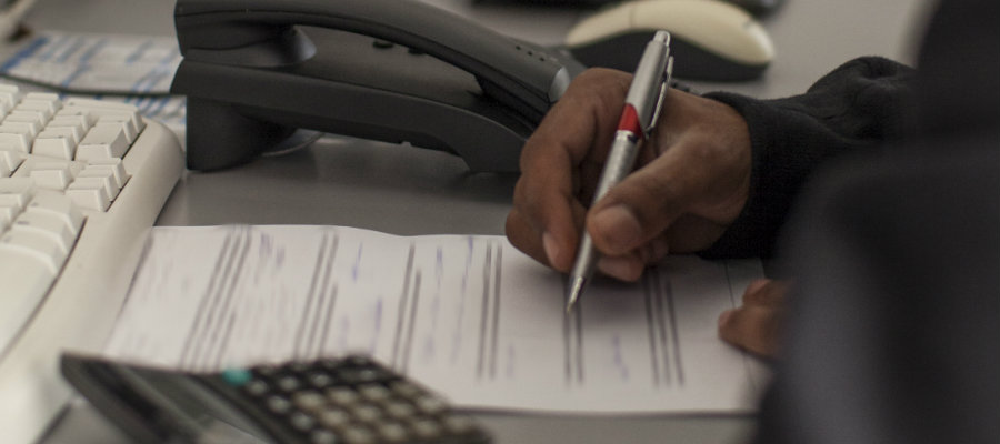 Student completing a form.